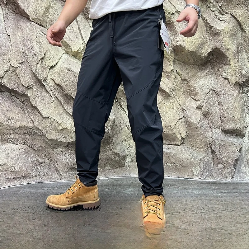 

New 2025 Spring Men's Outdoor Casual Pants Elastic Training Trousers Qui Dry Tailored Fit Straight Leg Breathable Faionable