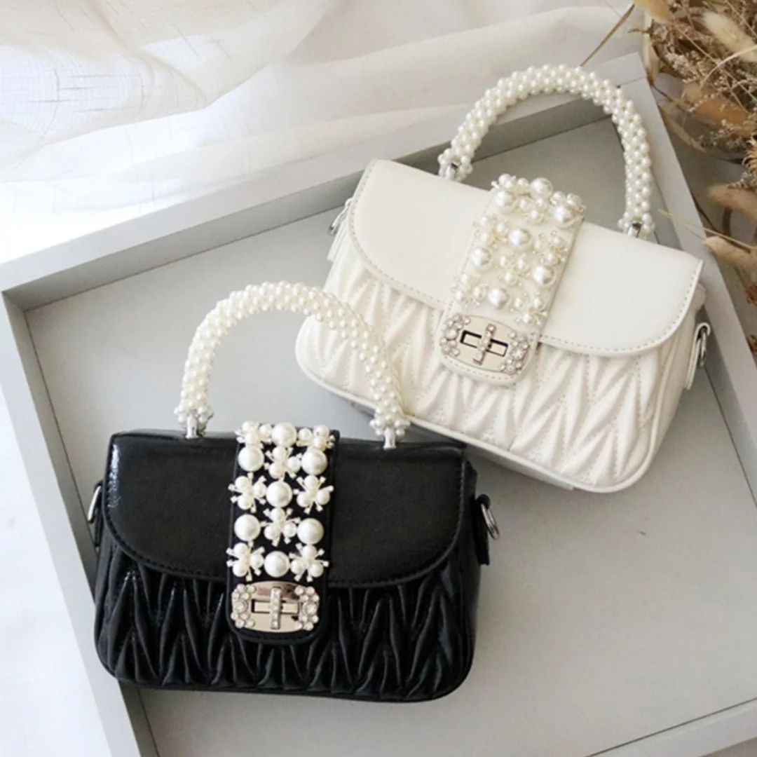 

Праздничный подарок, женская сумка с бантом и жемчугом, новинка 2025, ручная плиссированная сумка через плечо с бриллиантами, ниша, элитная роскошная милая сумка
