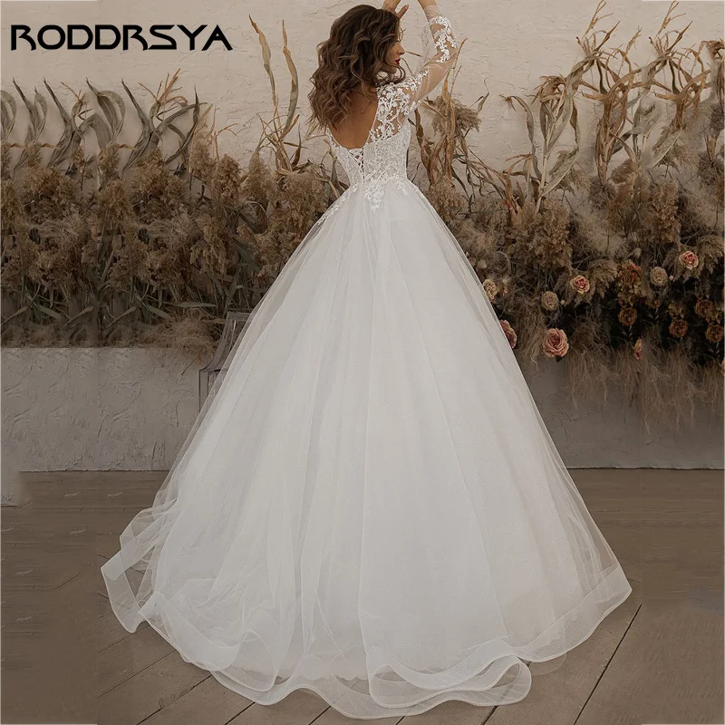 RODDRSYA فساتين زفاف عاجية أكمام طويلة مزين بالدانتيل مغرفة رقبة خط تول-فستان عروس بوهو vestido de noiva BeachRoddrsya عاج عرس ثوب كم طويل Appliques رباط عنق مستدير حرف واحد فقط ثوب الزفاف بوهيميا 2024 شاطئ أسود