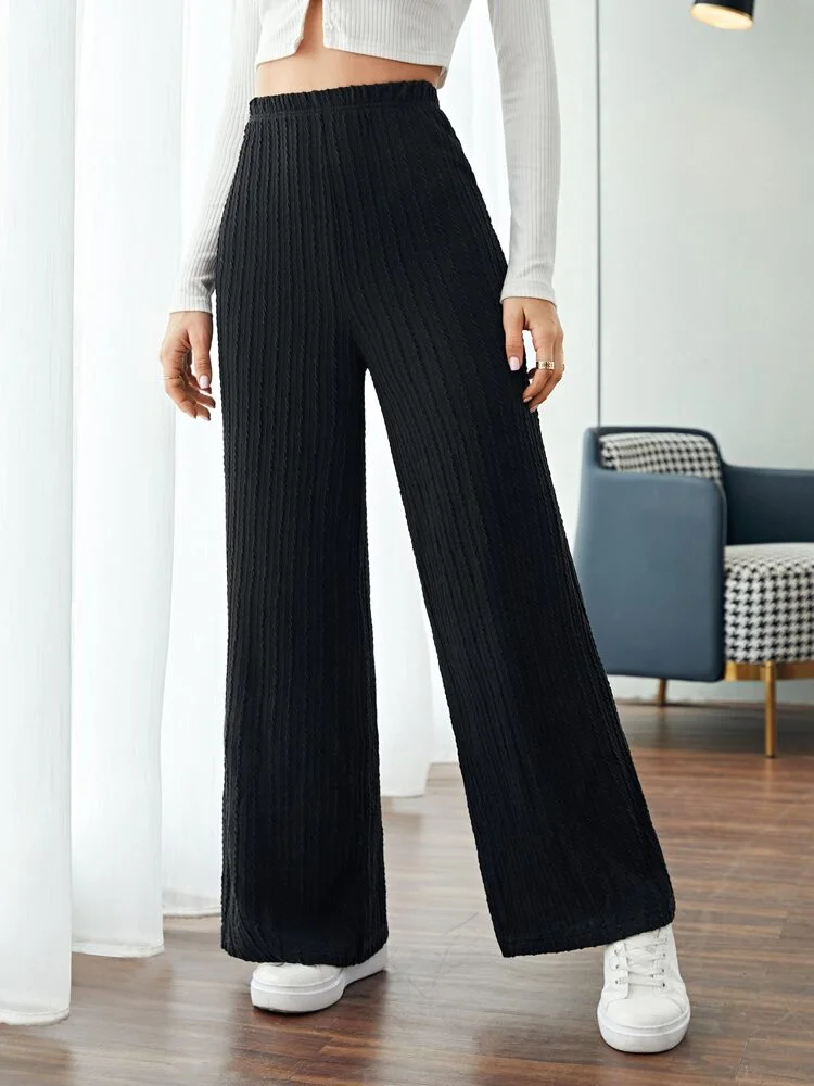 

A pair of women's casual style solid color threaded straight leg pants