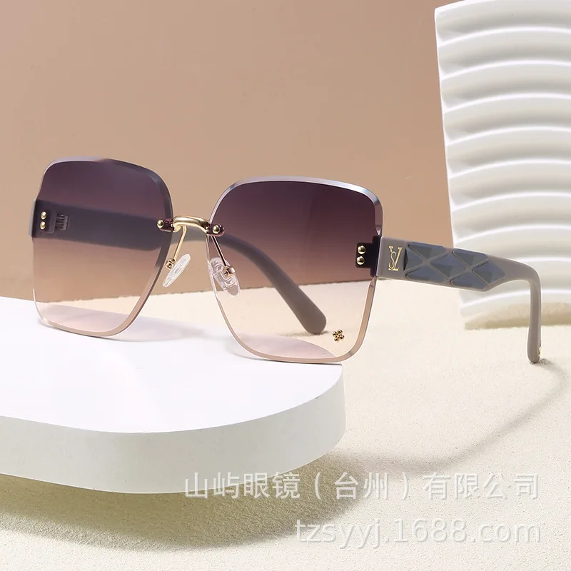

2025 новые модные модные безрамочные солнцезащитные очки с защитой от ультрафиолета, хит продаж премиум-класса, универсальные ​
