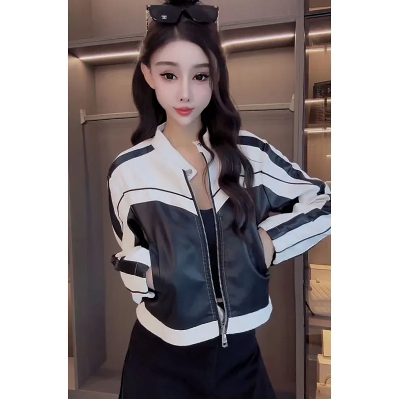 ฤดูใบไม้ผลิฤดูใบไม้ร่วงใหม่ความคมชัดเส้นเย็บ Pu หนังผู้หญิงหลวม Joker Stand Collar ระเบิดแจ็คเก็ตหนังสั้น