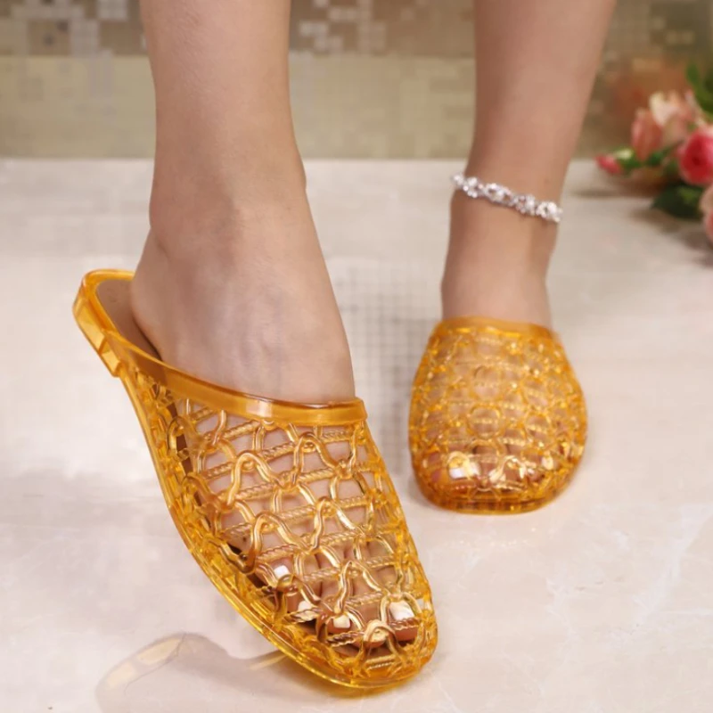 Baotou crystal slippers for women, transparent jelly gel, hollow-out, for outdoor wear, summer flat half slippers