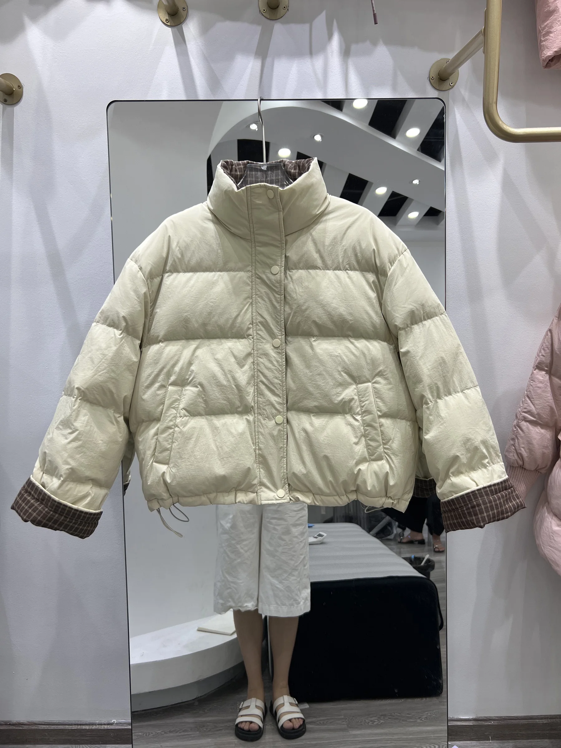 Chaqueta de plumón para mujer, chaqueta con cuello levantado a la moda, empalme para ir al trabajo, invierno 2025