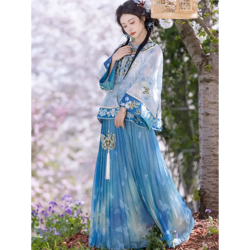 robe-d'ete-orientale-decontractee-haut-brode-a-col-ouvert-jupe-longue-plissee-imprimee