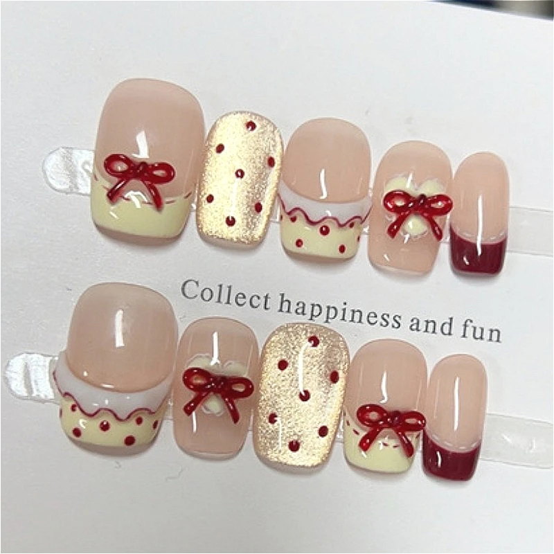 

10PCS Short Square Press on Nails Cartoon Bowknot Nude Base with Red Bow Gold Dot Details Sweet and Elegant Fake Nail Art