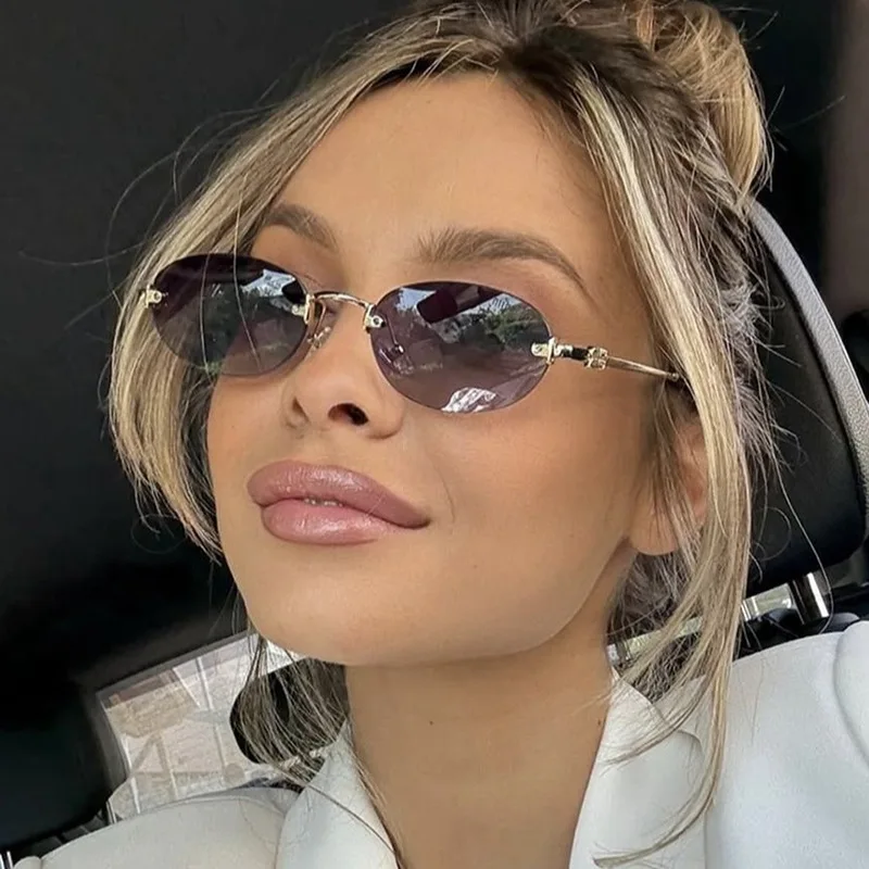 النظارات الشمسية البيضاوية بدون إطار 2025 النظارات الشمسية الجديدة نظارات شمسية كلاسيكية العصرية نمط مقعر فتاة ساخنة 7819 #1