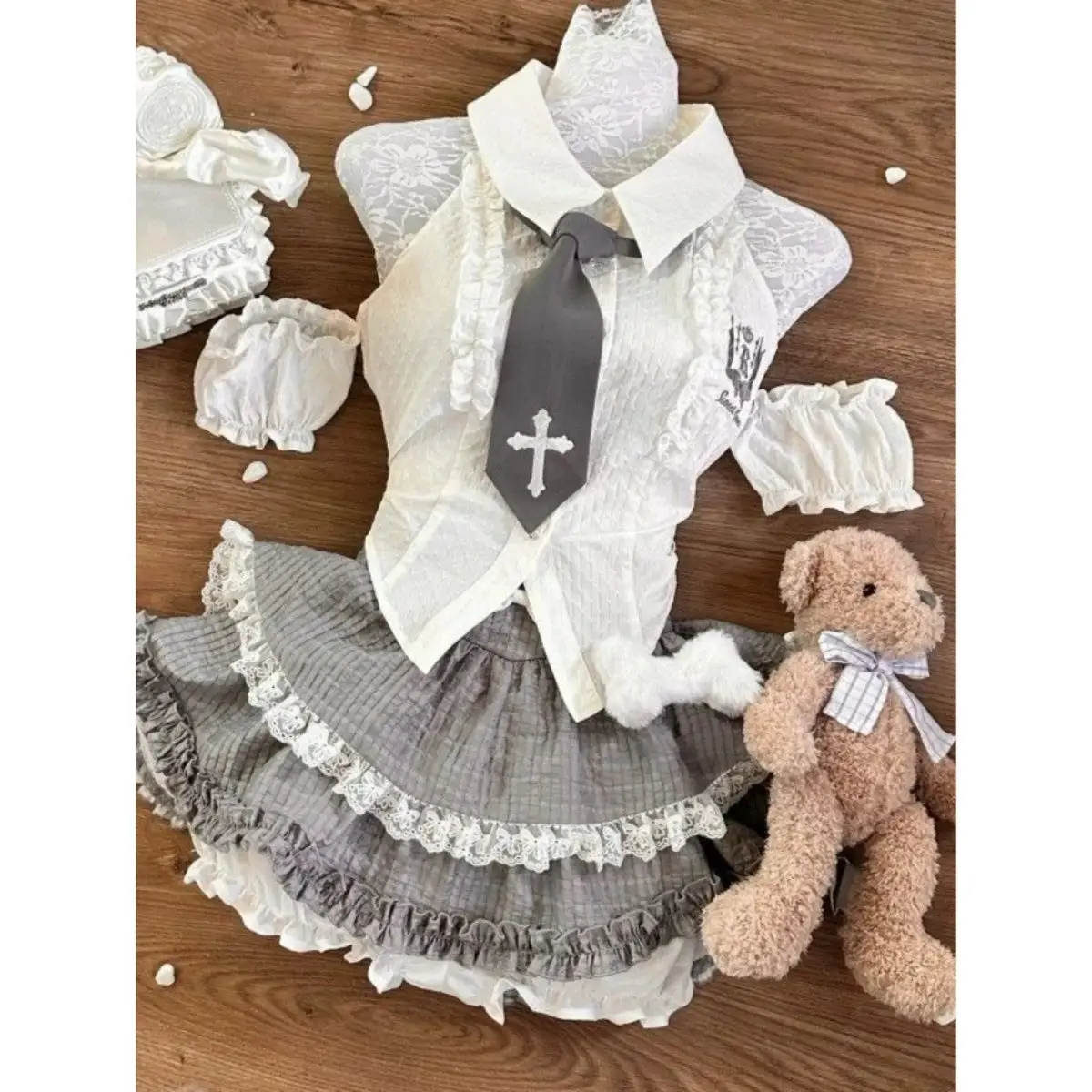 

Cute Preppy Style JK Uniform Hollow Out Short Sleeved Shirt + High Waist Lace Ruffle Edge Skirt + Cross Necktie Women Y2k Suits
