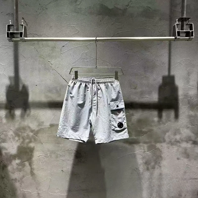 Tide Street Style Модные функциональные стильные быстросохнущие шорты Свободные повседневные повседневные шорты для пар с пятью брюками Мужские спортивные шорты