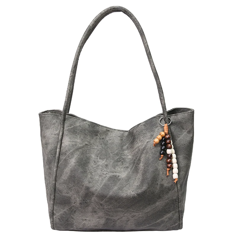 حقائب يد نسائية على الموضة لعام 2025 حقائب يد غير رسمية متعددة الاستخدامات PU بمشبك حقائب كتف ذات سعة كبيرة للتنقل بلون سادة وجودة عالية