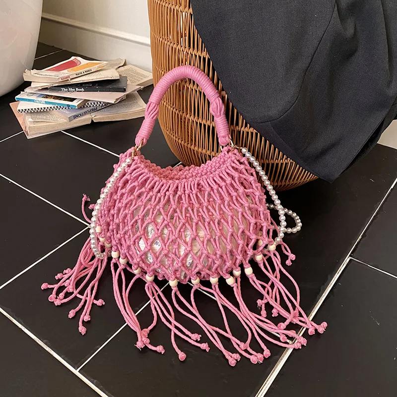 

Summer Cotton Rope Hollow Out Woven Bag for Women 2026 New Fashionable Tassel Bead Mesh Bucket Bag Vacation Beach Shoulder Bag