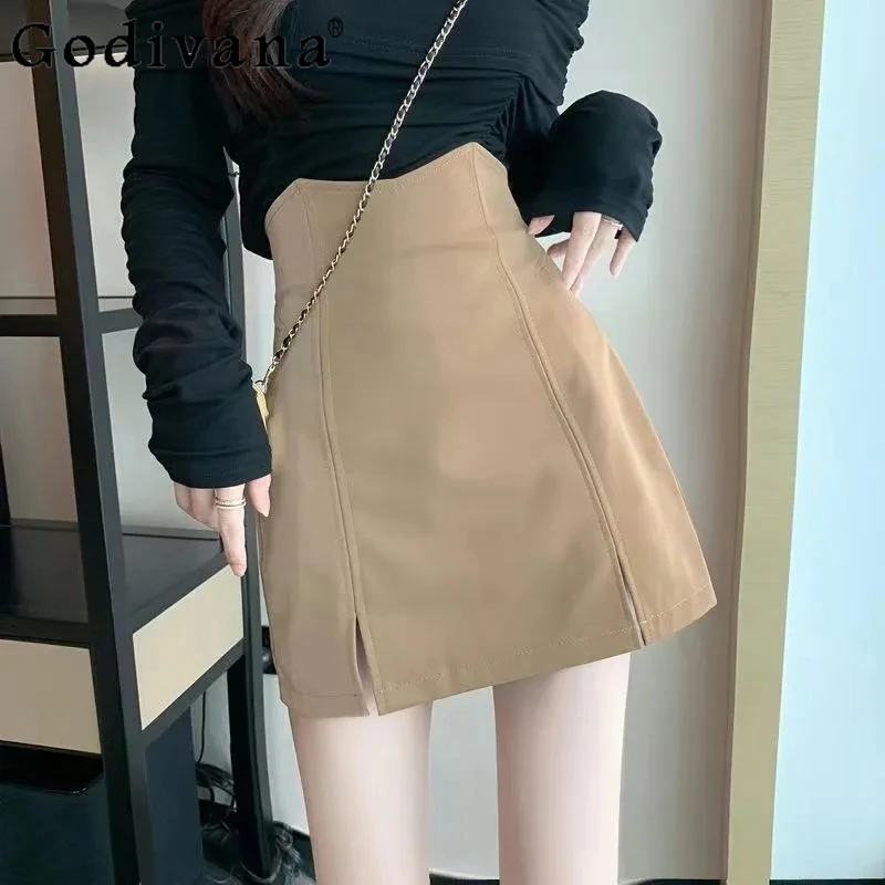 

Большой размер, корейская сексуальная возрастная юбка трапециевидной формы с разрезом и высокой талией, новые летние женские нерегулярные черные универсальные короткие юбки