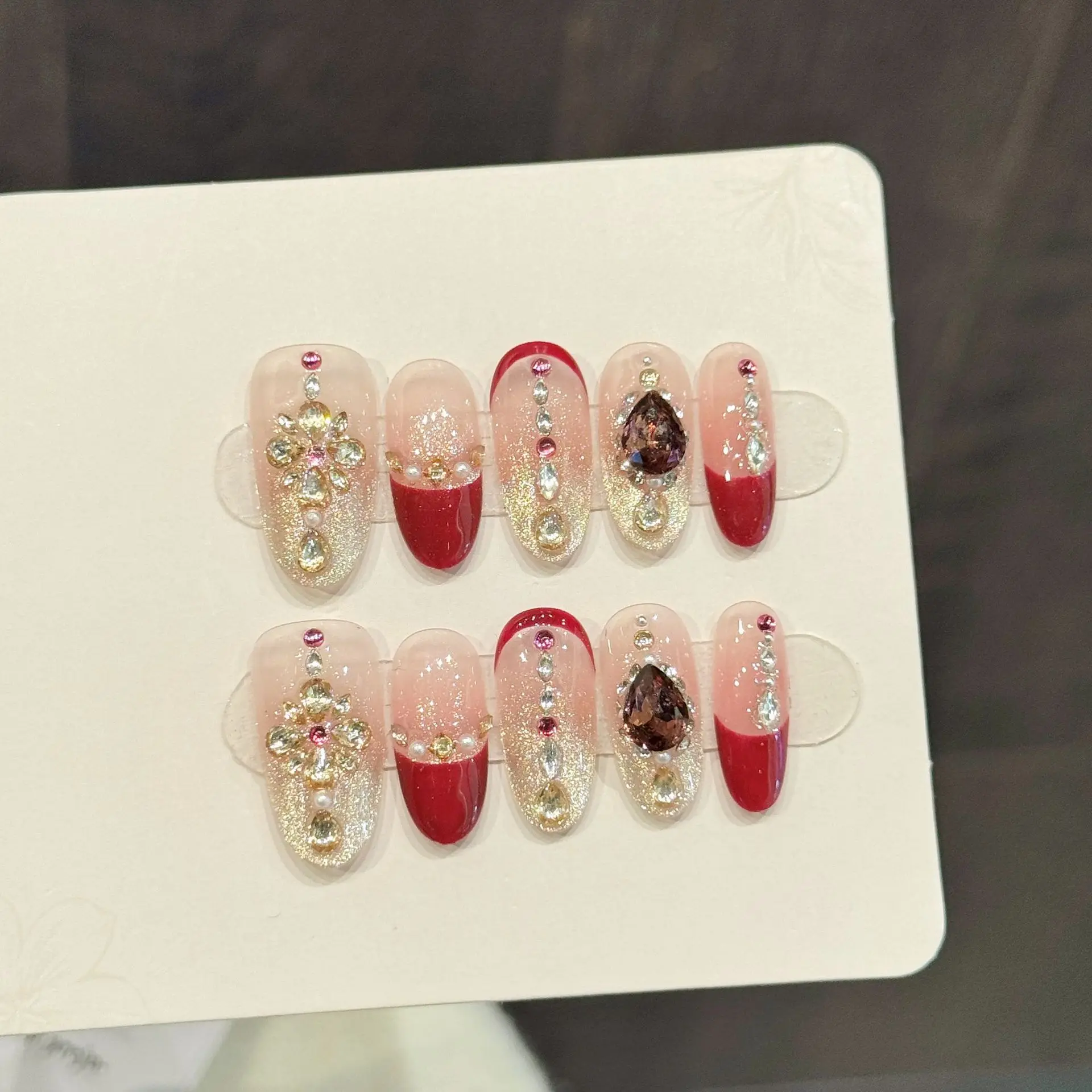

10pcsLight Luxury Handmade Oval Press On Nails Shiny Champagne Cat Eye Red French Rhinestone Design Fake Nails Wearable Nail Art