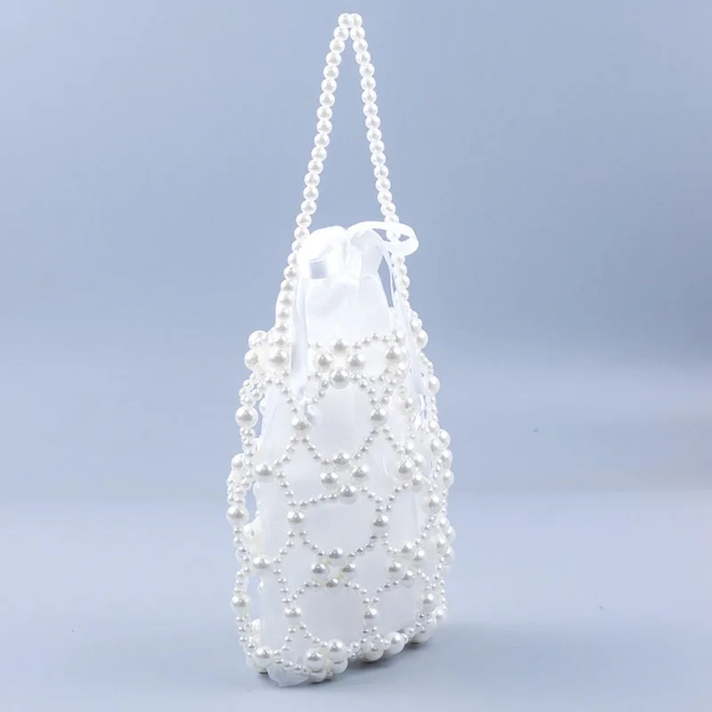 حقائب يد مصنوعة يدويًا من الفضة مطرزة للنساء حقائب يد مجوفة على الموضة لقضاء عطلة الشاطئ مطرز بالخرز حقائب حفلات بمقبض للهاتف