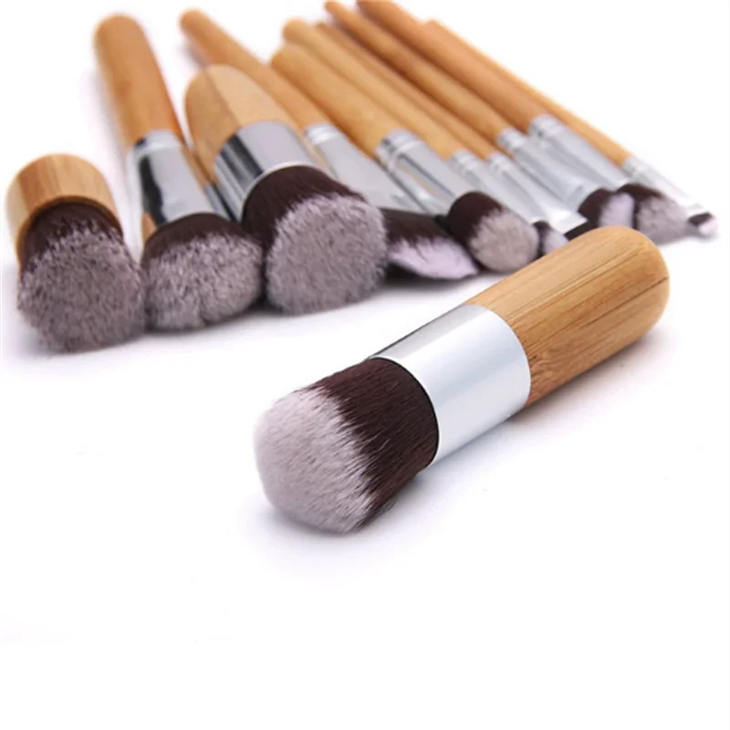 مجموعة فرش مكياج مكونة من 11 قطعة من الخيزران مع حقيبة قماش صديقة للبيئة عبر الحدود الأكثر مبيعًا أدوات تجميل محمولة بالجملة