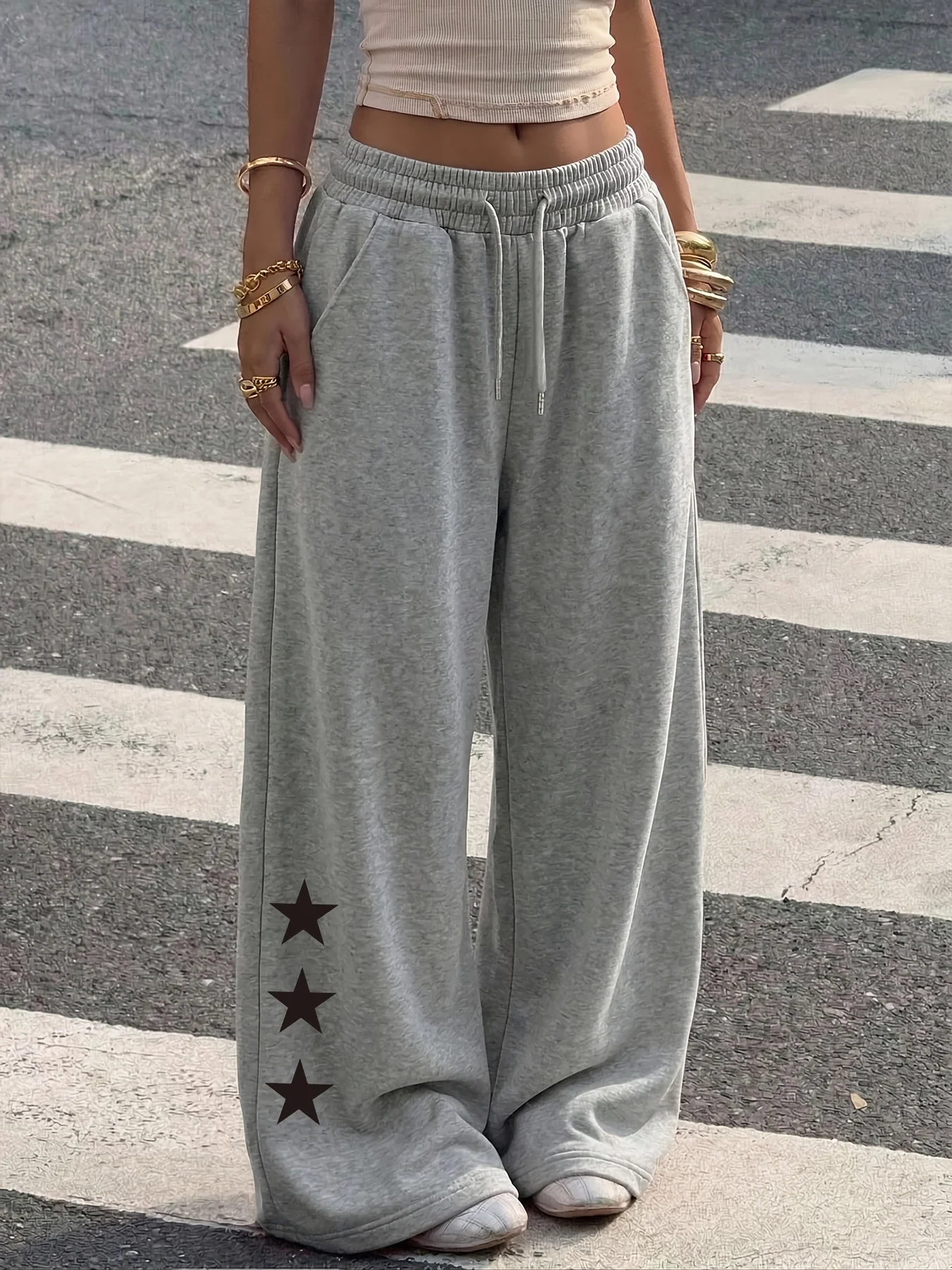 

Новые женские брюки больших размеров с принтом звезд, флисовые, с эластичной талией, прямые, модные и универсальные.