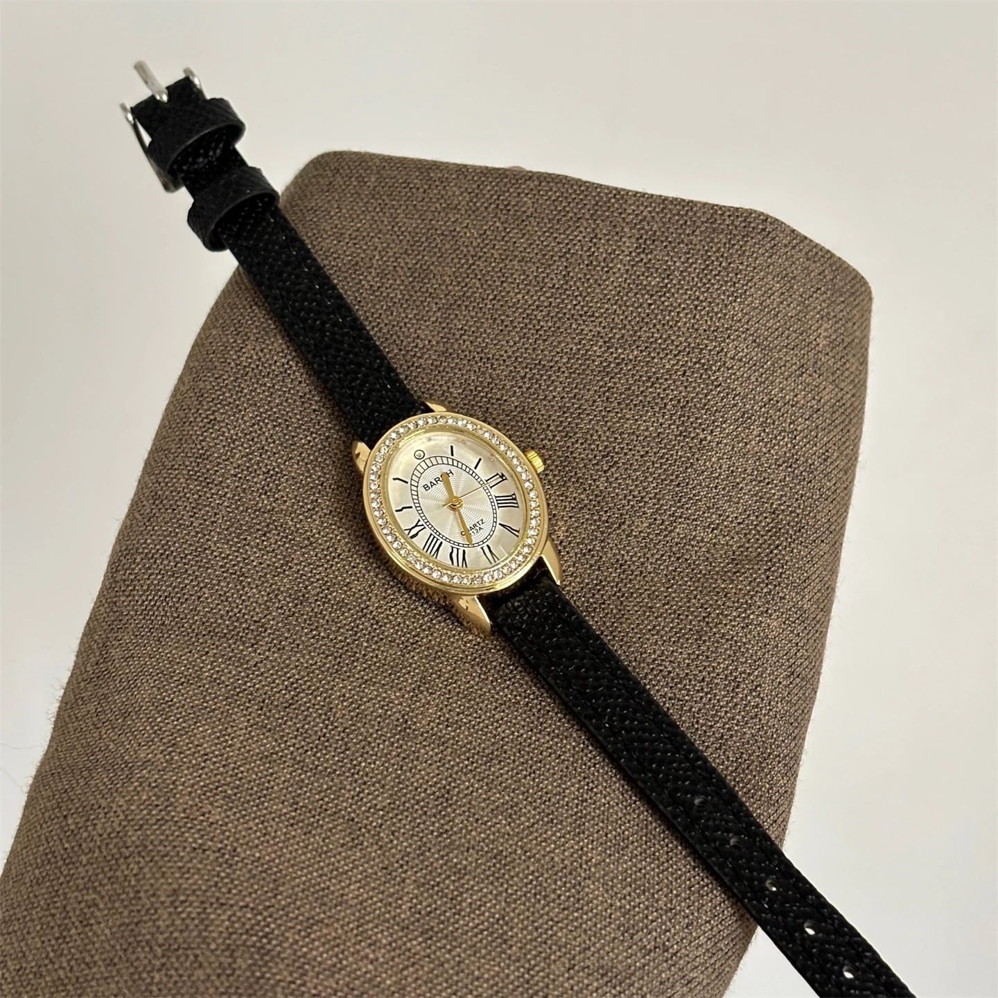

Elegant women's wristwatch, black and gold teardrop-shaped watch, vintage style with leather strap, a perfect gift for women.