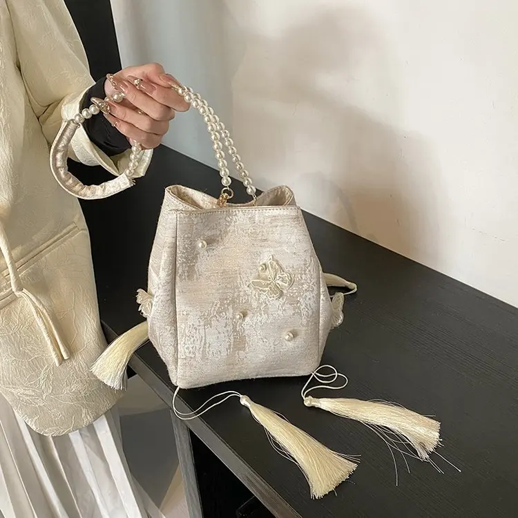 

2026 New Chinese Pearl Fashion Small Bucket Bag Niche Design Butterfly Decoration High-end Shoulder Handbag