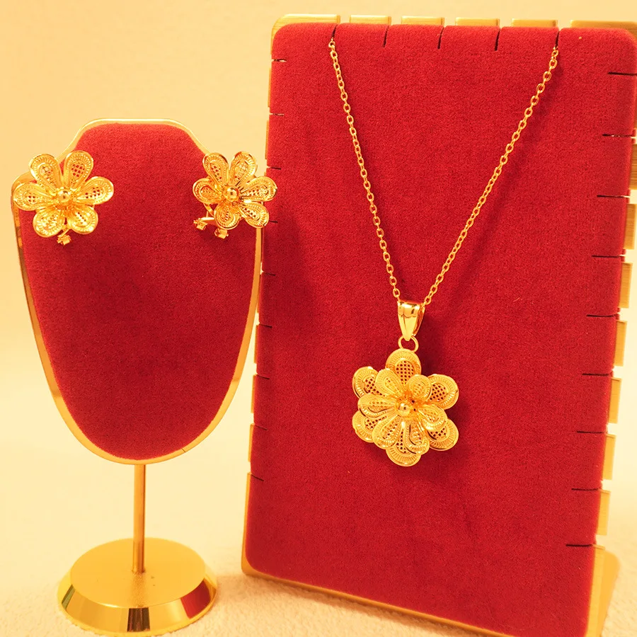 9999 gold love jewelry from a Middle Eastern Dubai lady - floral design necklace and earrings, perfect for back-to-school gifts