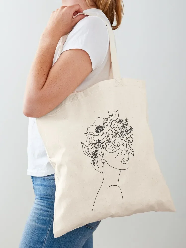 Abstract face with flowers line art drawing. Portrait minimalistic style. Botanical print. Flower head. Tote Bag