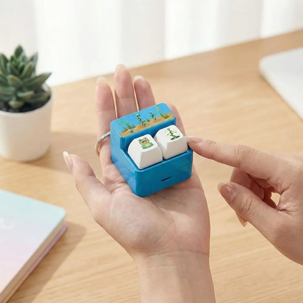 Fingertip Button Keyboard Games Keychain with LED Light Plastic Voice-Activated Keychain Portable Cartoon Phone Stand