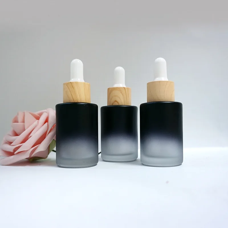 

30ML Matte Frosted Black Glass Liquid Essential Oil Perfume Bottle with Reagent Dropper and Wood Grain Cap Packing Bottles