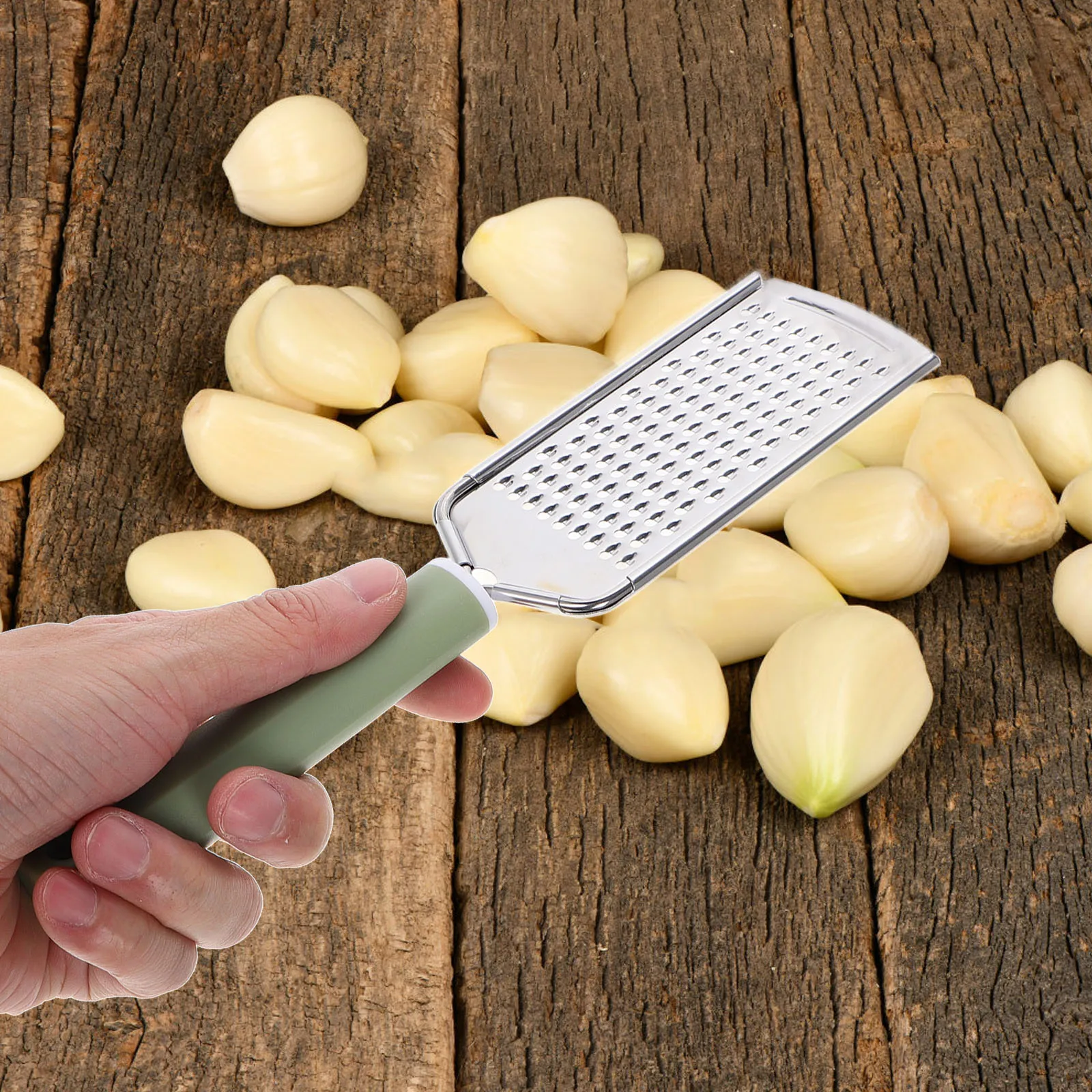 

Stainless Steel Handheld Cheese Zester Multifunction Garlic Shredder Lemon Vegetable Chopper Kitchen Tool Garlic Clipper