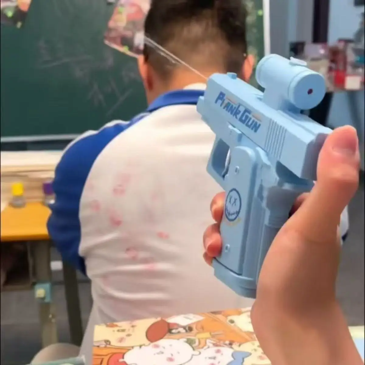 Nueva y creativa pistola de agua de doble cara, juguete de descompresión de chorro de agua inverso, juguete de pistola de agua balística hacia atrás