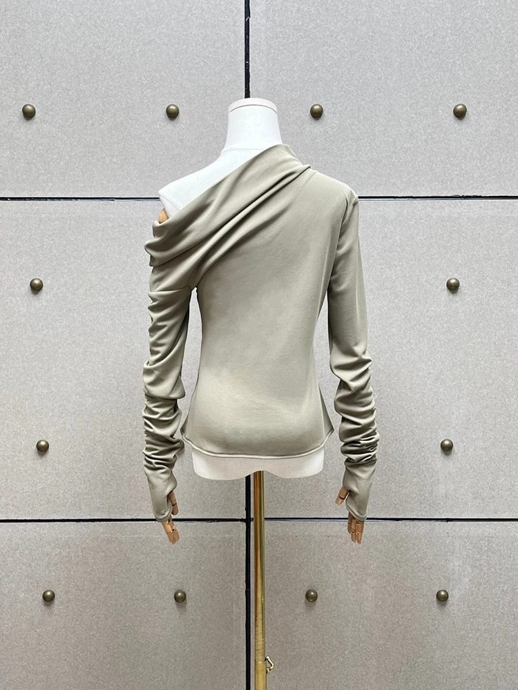 Asymmetric off-shoulder long-sleeve top—a stylish, versatile, and fitted piece for women (Autumn/Winter 2026 collection).