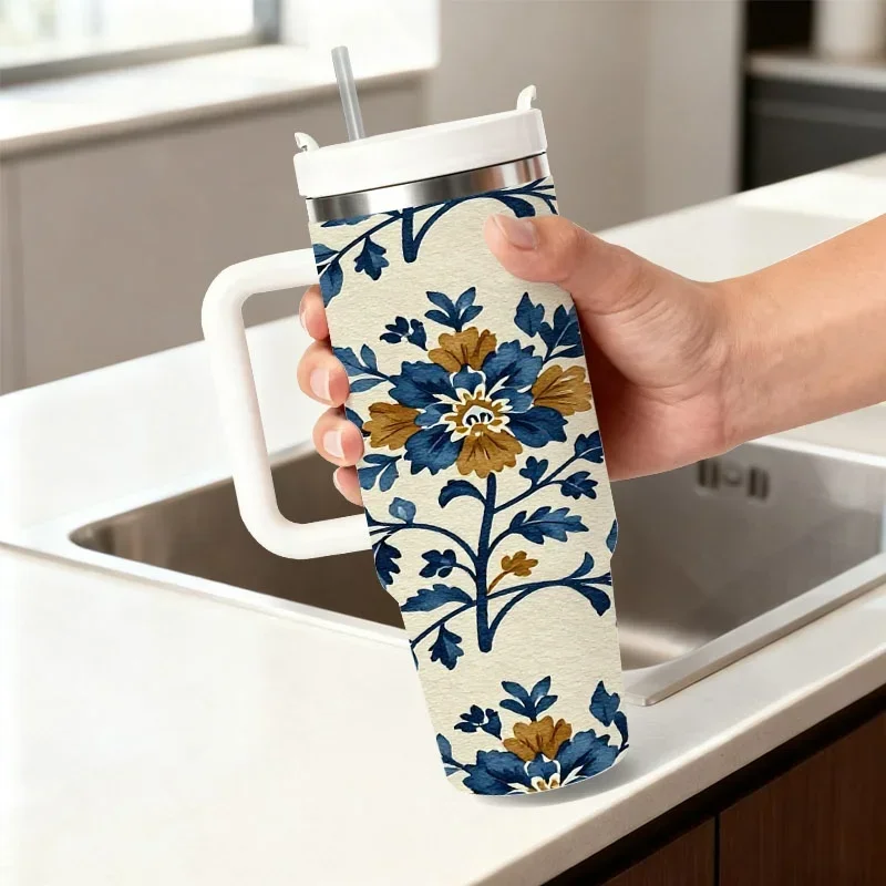 Seamless Floral Print 40oz Stainless Steel Insulated Tumbler, Light Beige Base with Blue Flowers, Yellow Centers and Detailed Blue Leaves, Stylish Digitally Printed Drink Container for Daily Drinks, Road Trips and Office Use
