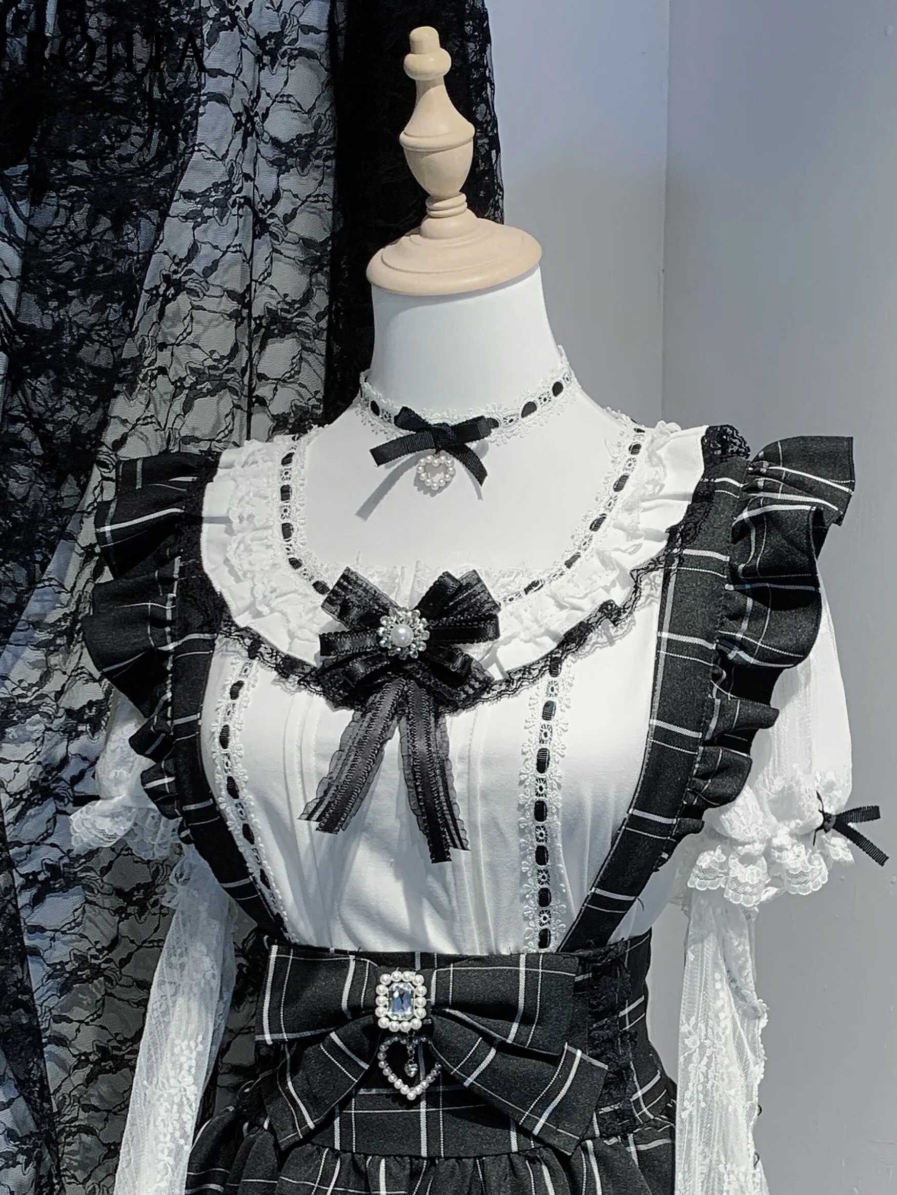 

Women’s Sweet Lolita Puff Sleeve Blouse Short Sleeve Bow Lace Japanese Black and White Apanese Gothic Style Top