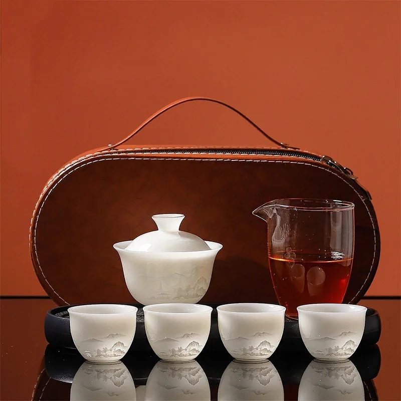 Luxury White Cup Uncut Jade Porcelain Embossed Travel Tea Set Outdoor High-end One Pot Four Cups Camping Tea Gaiwan Bowl Tea Cup