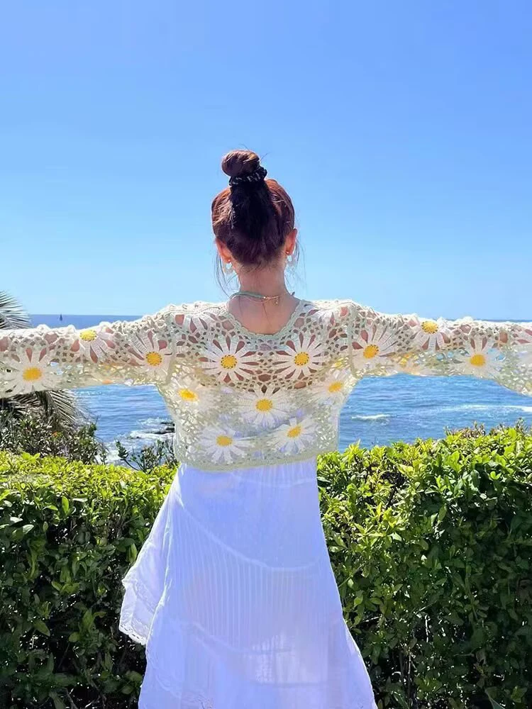 เสื้อผ้าผู้หญิงฤดูร้อนในยุโรปและอเมริกาหวานอเนกประสงค์เดซี่ถักคาร์ดิแกนกลวงลูกไม้ขึ้นเสื้อคาร์ดิแกนคอวี