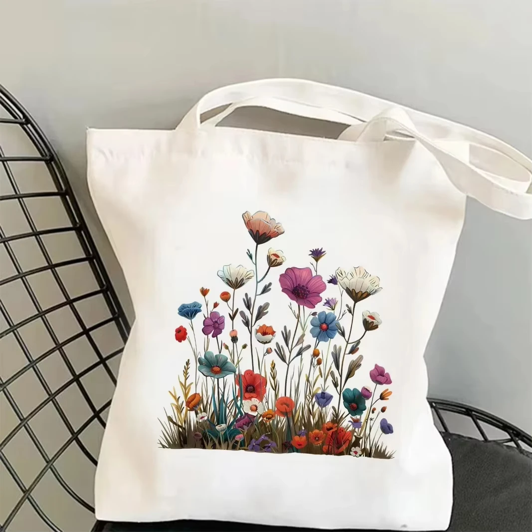 2026 A canvas handbag featuring simple grass patterns and floral designs, it is both fashionable and practical