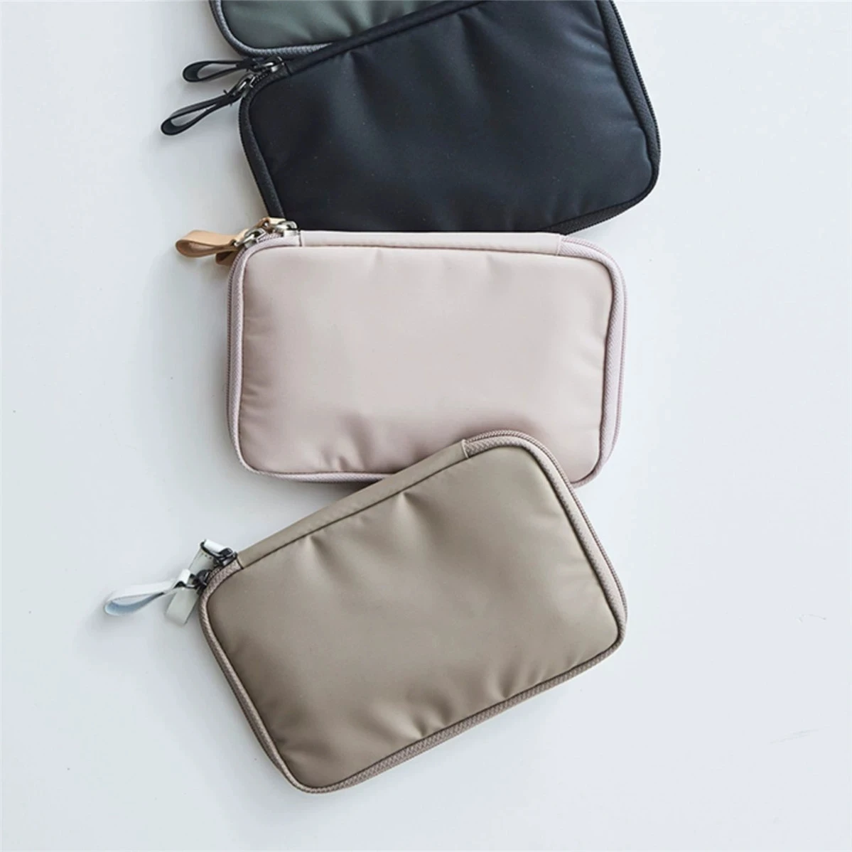 

Solid color new creative nylon travel passport bag, men's and women's hand-held ID wallet, mobile bill storage bag