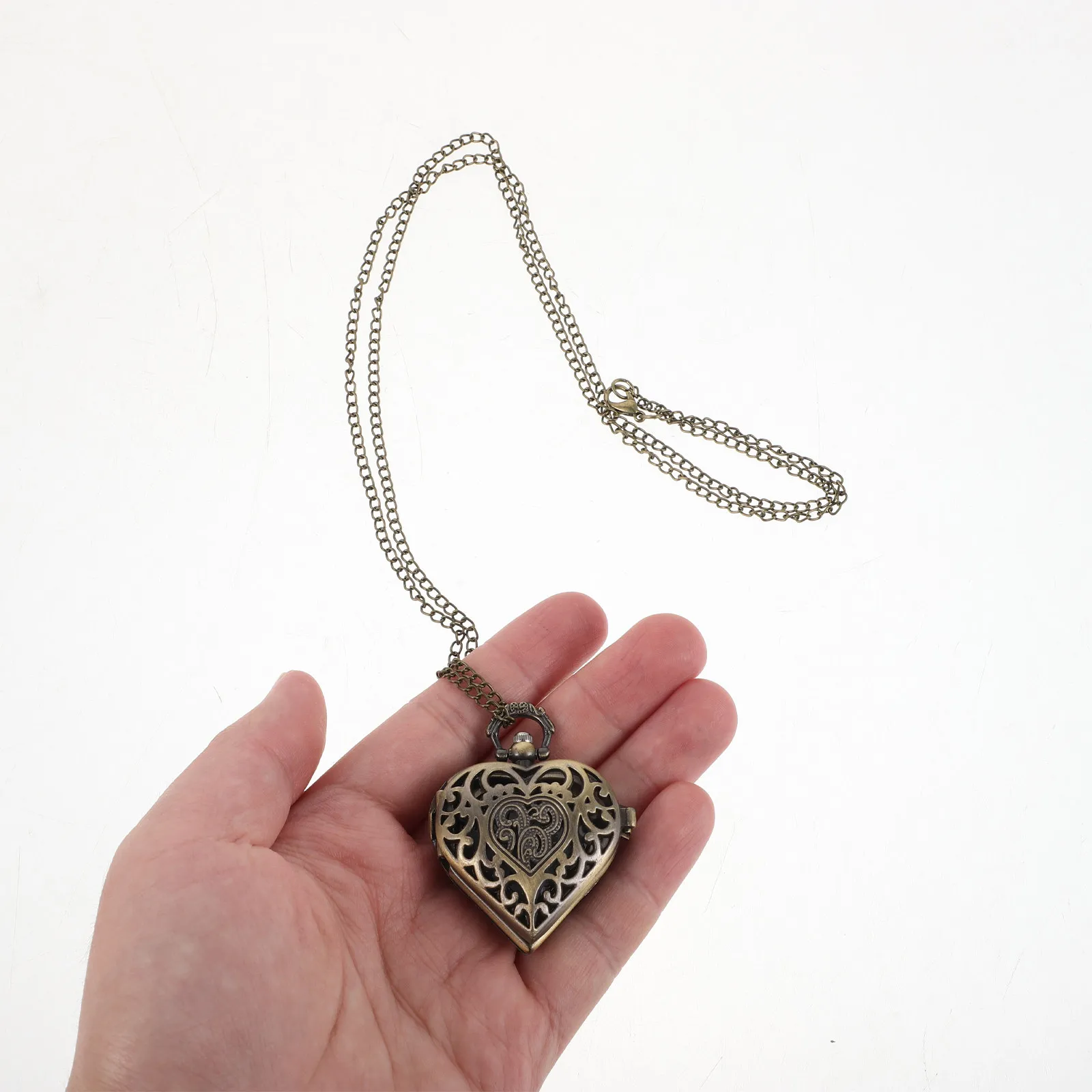 

2 шт. винтажных карманных часов в форме сердца, механические, с римскими цифрами, мужские, с ручным заводом, на цепочке, кулон-часы, для костюма