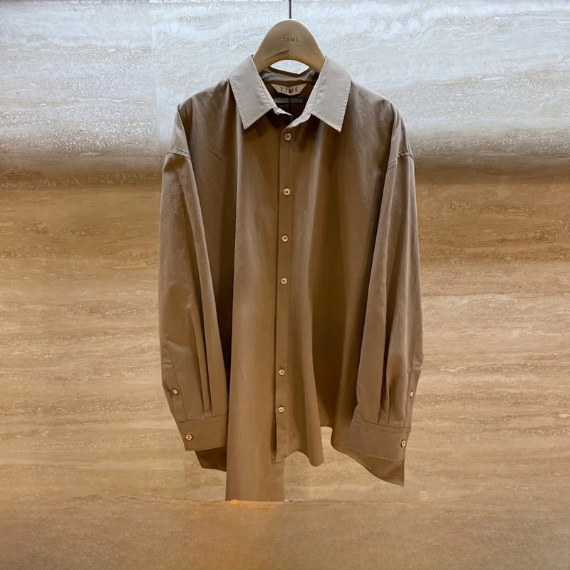 

Discounted Self-Kept 00% Cotton Asymmetric Design Collared Versatile irt Korean Sle Long Sve Button Detail Pure Color