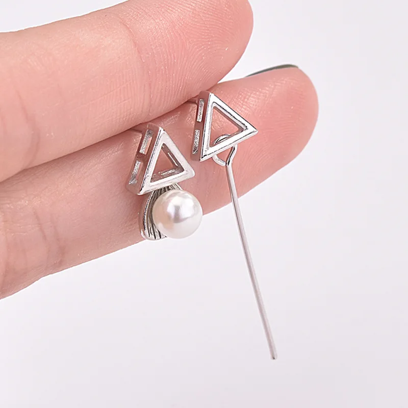 Korean-style sweet triangular stud earrings with artificial pearls and geometrically asymmetrical design as jewelry items