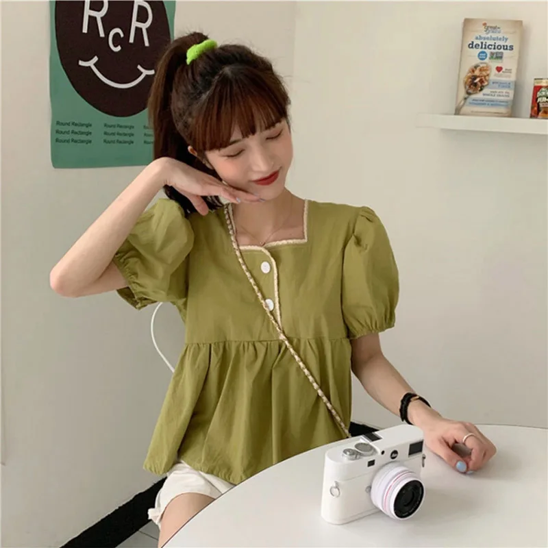 Camicie a maniche corte da donna svasate calde con lacci in rete dolce ragazze design temperamento vacanza fine settimana lavorato a maglia chic da donna a pois