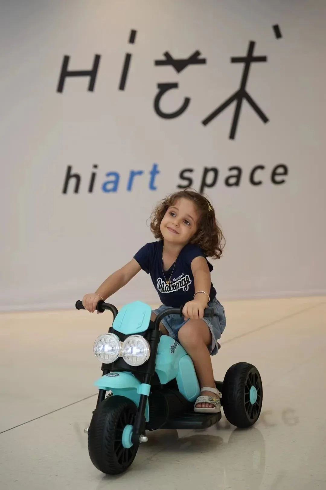 Children's electric three-wheeled motorcycle, remote control can sit on baby beautiful baby rechargeable battery toy