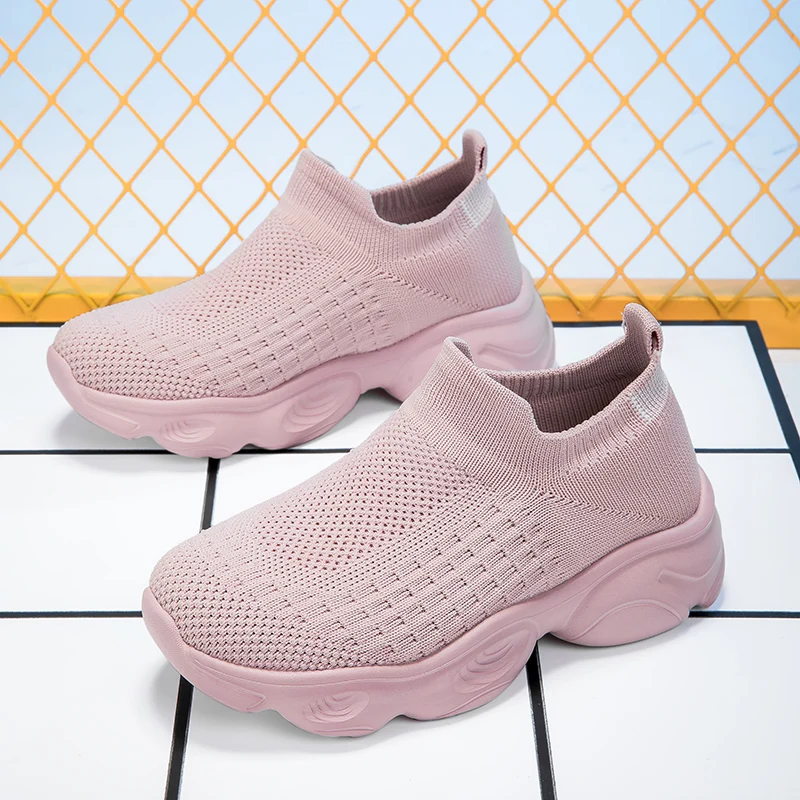 A pair of children's slip on knit sneakers, breathable stretch casual shoes, lightweight cushioned daily walking footwear CH-687