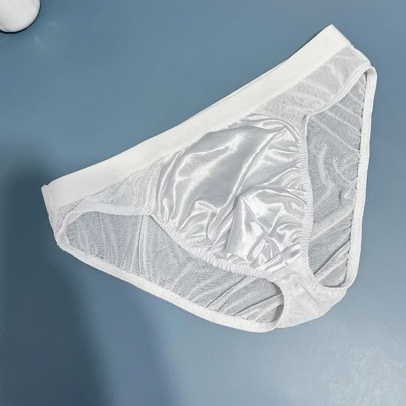 لامعة الرجال شبكة ملخصات كيس مزموم السراويل لون الحلوى بيكيني Hombre سراويل منخفضة الخصر مريحة رجل ملابس داخلية مرنة بحر