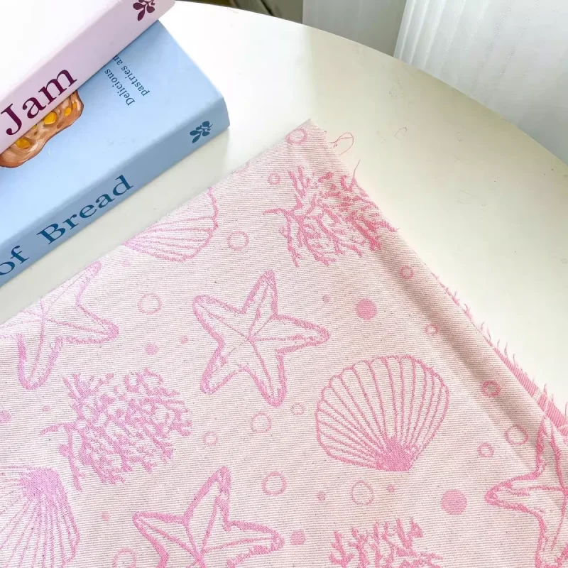 

Pink jacquard fabric, used for making handmade bags, dresses, shirts, and other fabrics.