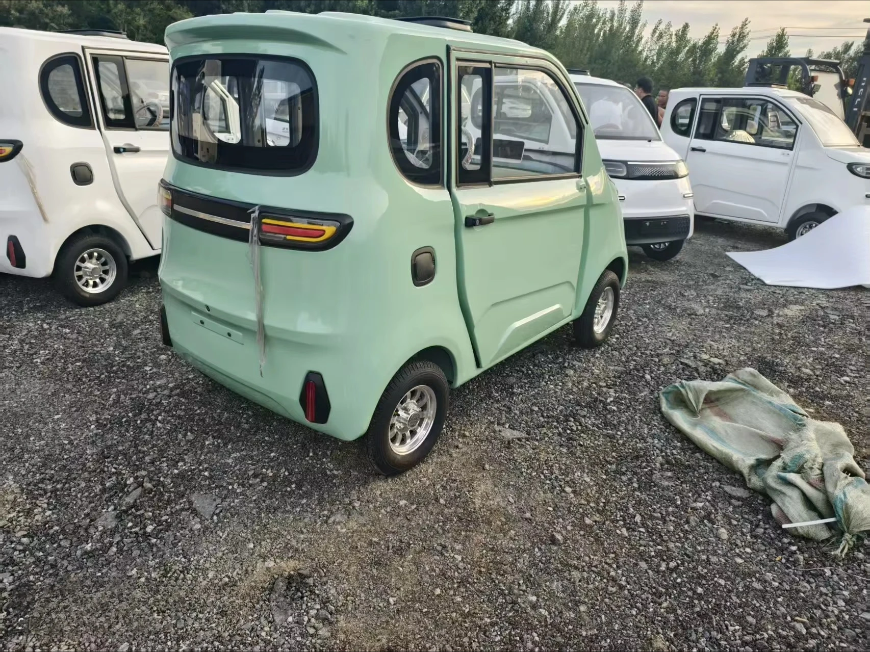 4-Seat China Mini Electric Cabin Scooter Car Vehicle 1000 Watts Motor Power Cheap Adult 4 Wheel Electric Vehicle