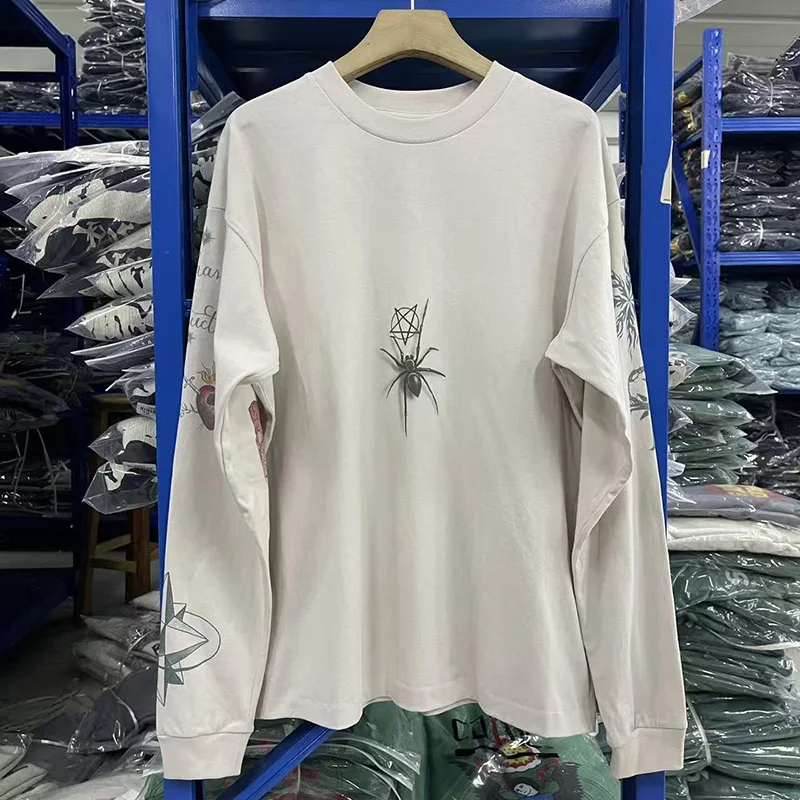 الكرتون الرسومات الكتابة على الجدران طباعة الاسمنت الأبيض قاعدة تي شيرت المحملة الرجال النساء أعلى جودة القطن المتضخم سانت بأكمام طويلة تي شيرت