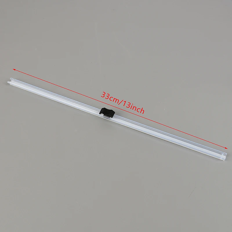 Dispenser per involucro di plastica e taglierina per pellicola per alimenti parte per taglierina per pellicola trasparente
