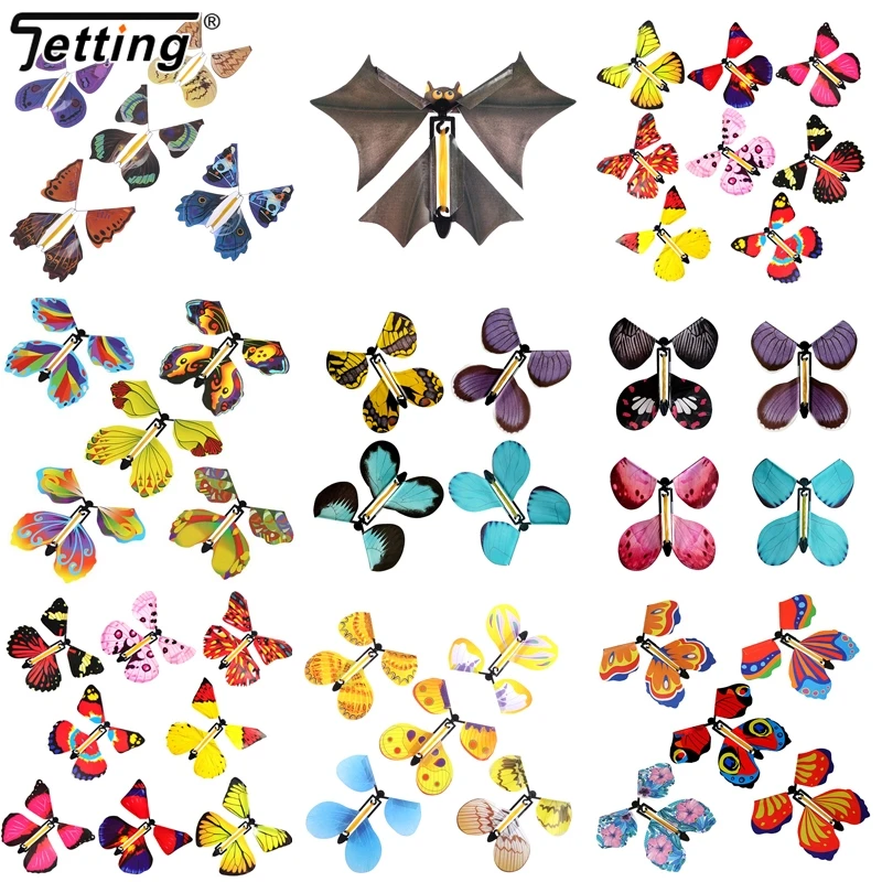 10 adet sihirli uçan kelebekler kurmalı oyuncak gökyüzünde imi tebrik kartları lastik bant Powered çocuklar sihirli sahne sürpriz hediye