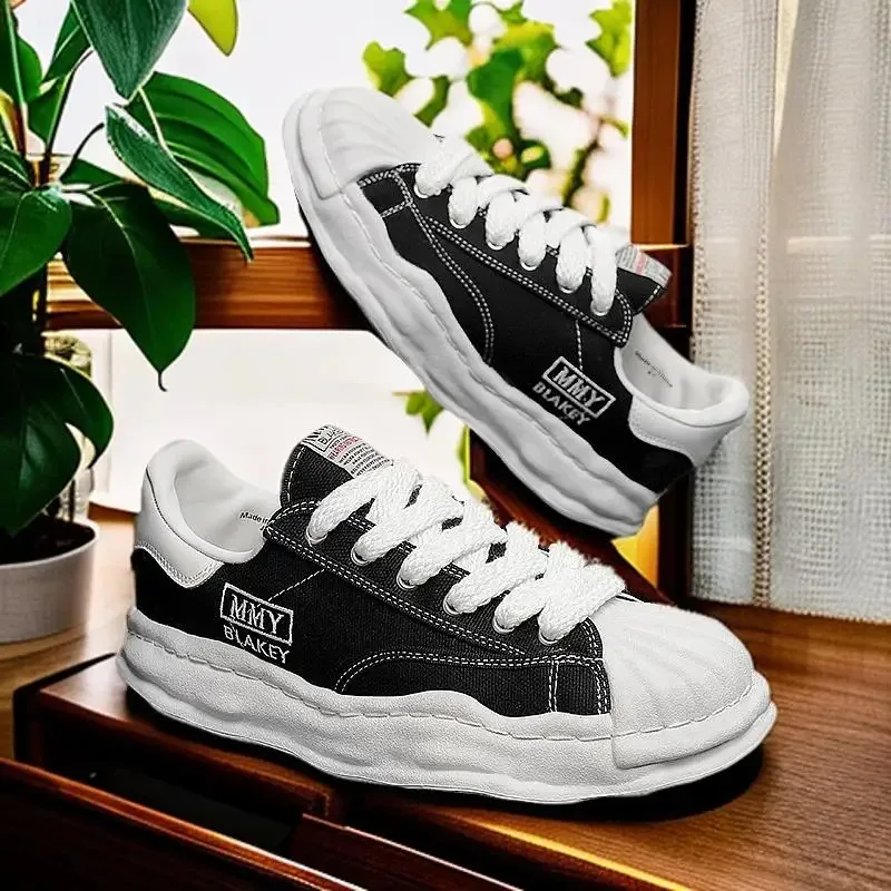 Eenvoudige en sfeervolle leren canvasschoenen en veelzijdige, ademende, comfortabele casual sportschoenen