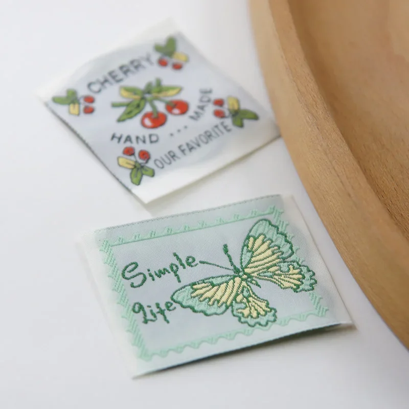 New stock colored handmade fabric label with intricate flower series,embroidered woven label, auxiliary materials, sewing  label