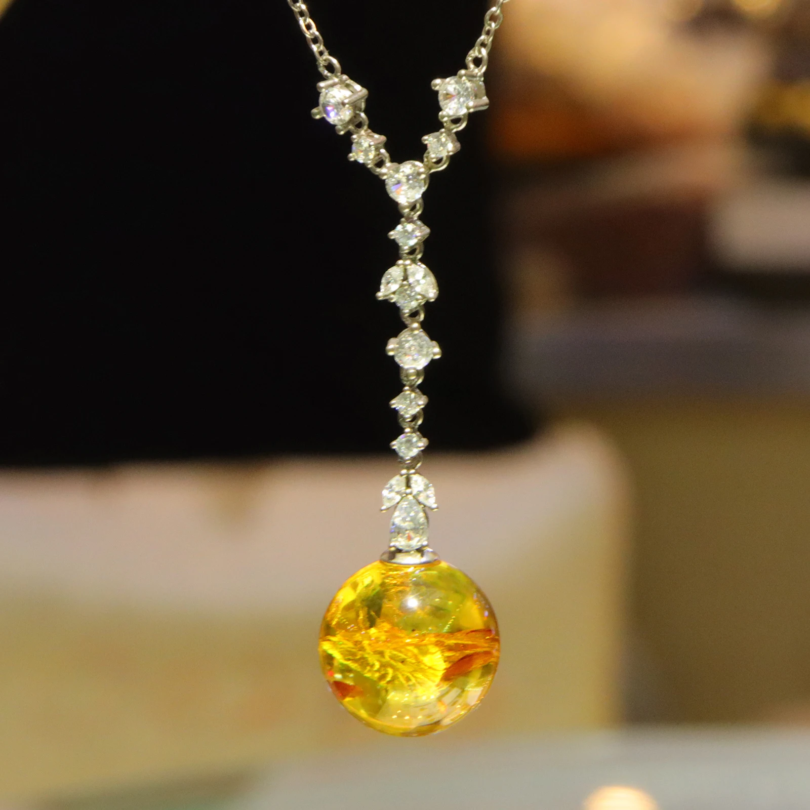 

Natural Mexican Flower Amber Pendant Solid Silver 19mm Amber Bead Y Drop Design with Silver Chain